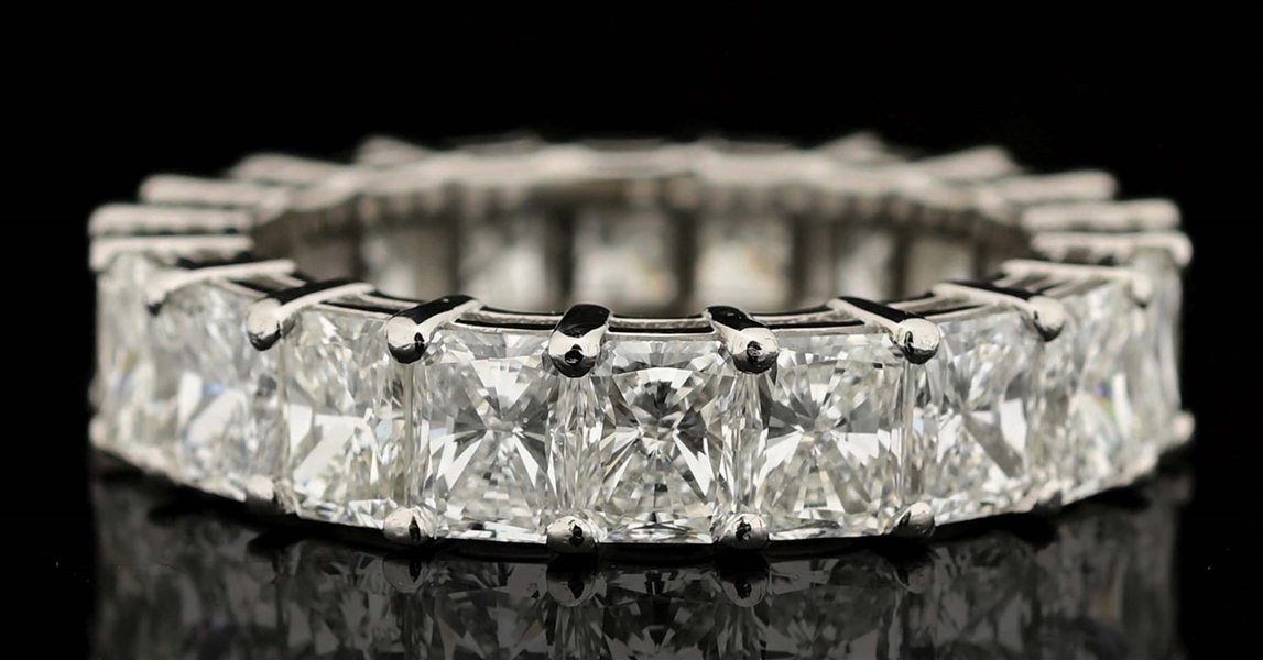 LADIES PLATINUM 6.50CT RADIANT CUT DIAMOND ETERNITY BAND.