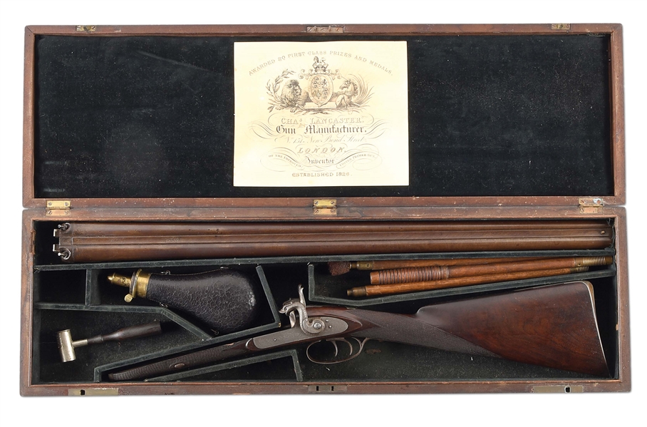 (A) AN INTERSTING AND WELL ENGRAVED ENGLISH SHOTGUN, PROBABLY CHARLES LANCASTER, SIDE BY SIDE PERCUSSION SHOTGUN, CASED.