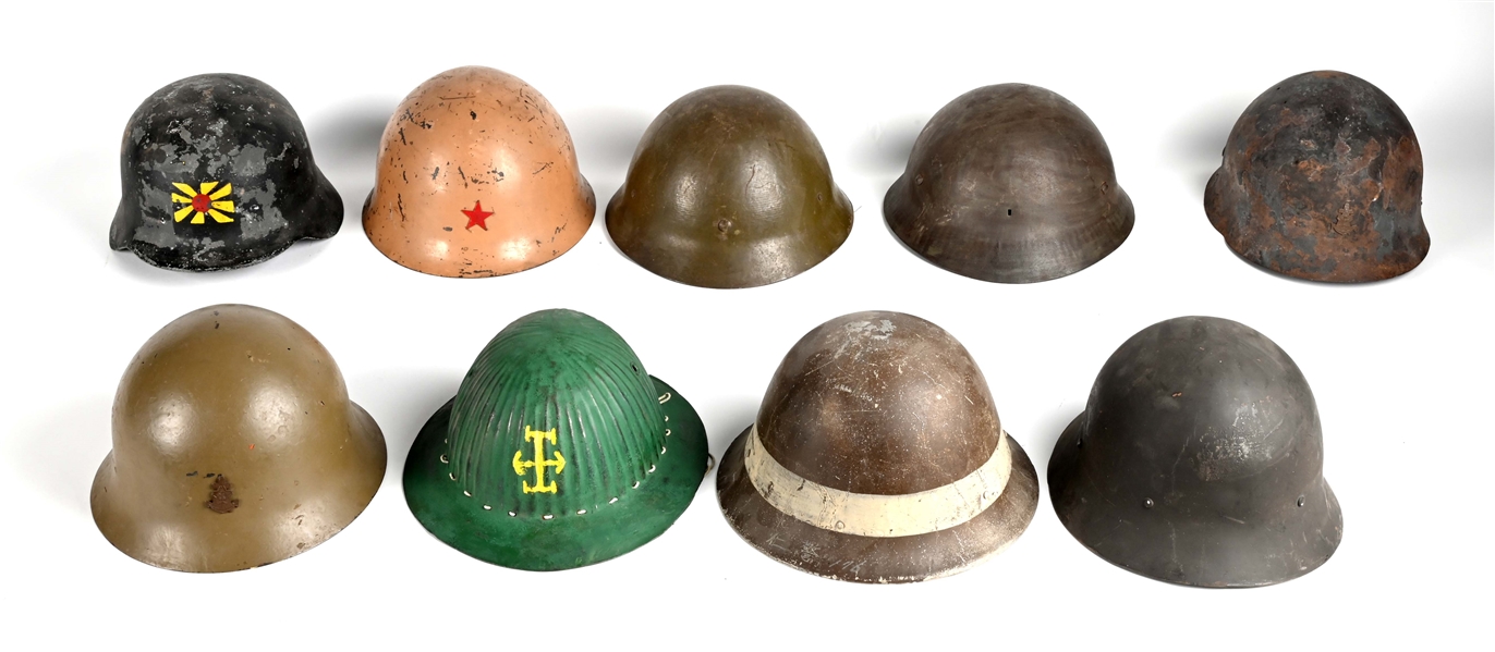 LOT OF 9: JAPANESE WWII HELMETS.