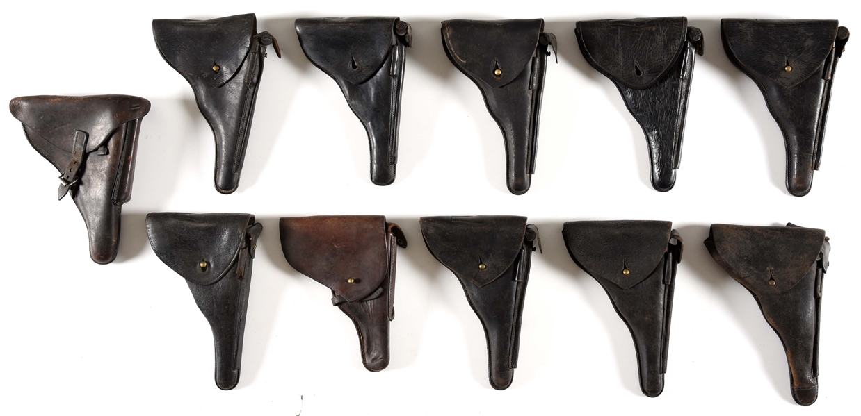 LOT OF 11: LEATHER HOLSTERS.
