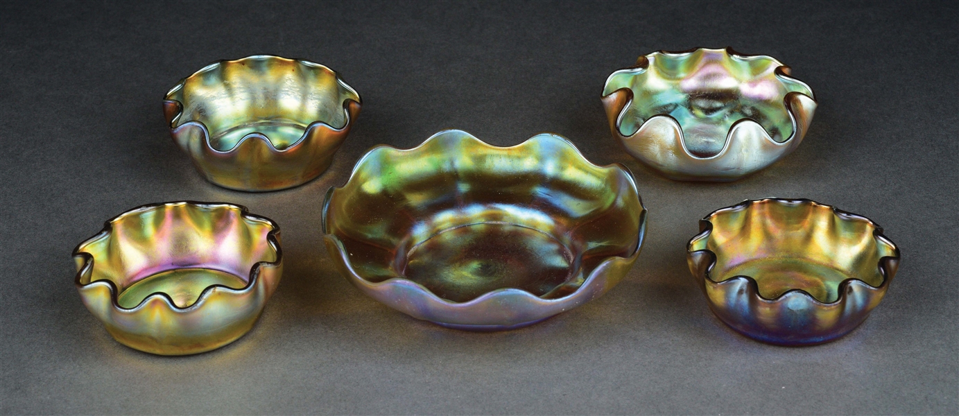 LOT OF 5: SET OF TIFFANY STUDIOS FAVRILE GLASS SALTS AND BOWL.