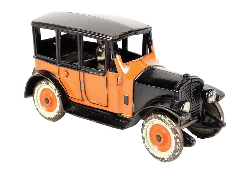 CAST IRON ORANGE AND BLACK TOWN CAR.