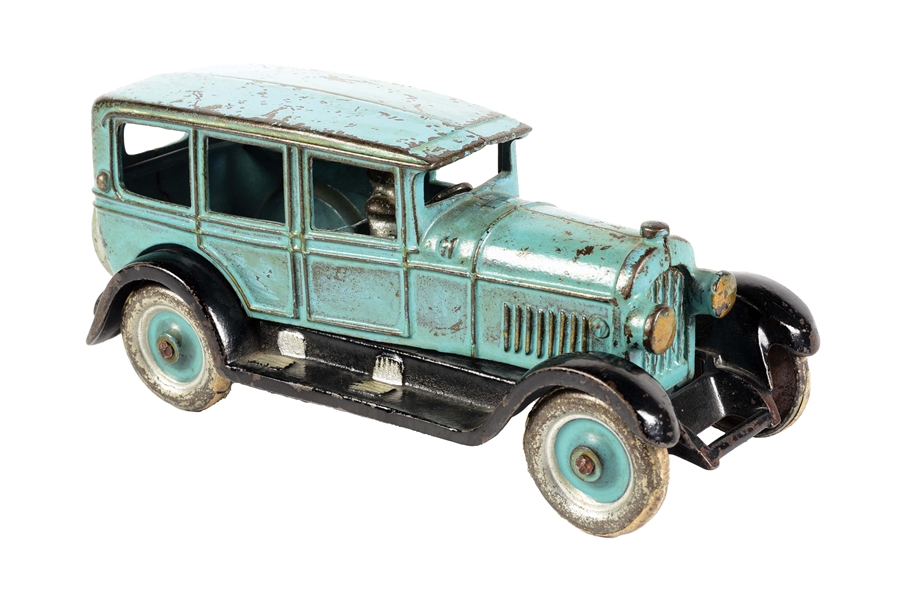 CAST IRON DENT SEDAN TOY WITH DRIVER.