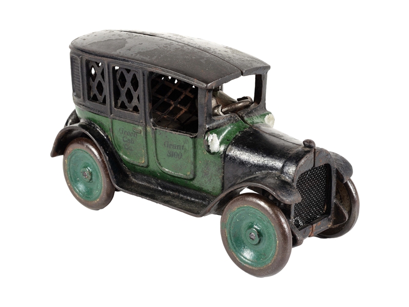 CAST IRON ARCADE GREEN CAB TOY TAXI CAR W/ DRIVER.