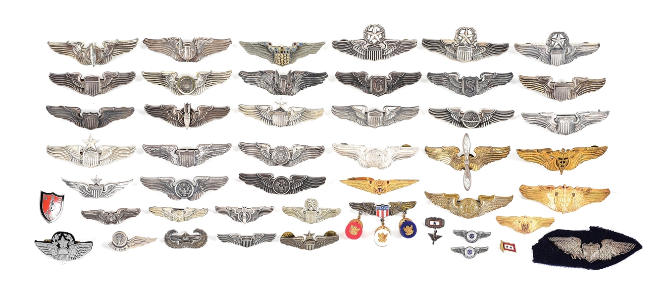 LARGE LOT OF US WWII ERA ARMY AIR CORPS WINGS.