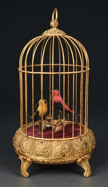 WEST GERMAN WIND-UP SINGING RED AND YELLOW BIRDS IN CAGE