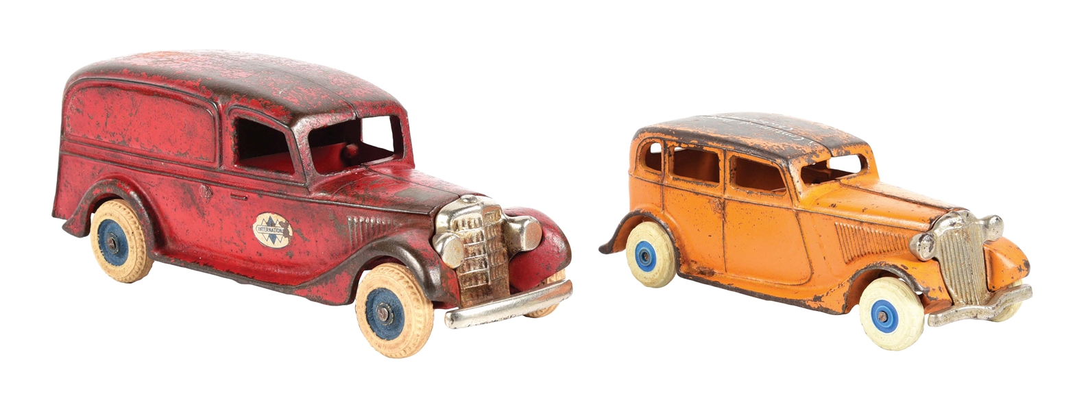 LOT OF 2: CAST IRON ORANGE AND RED TOWN CARS.