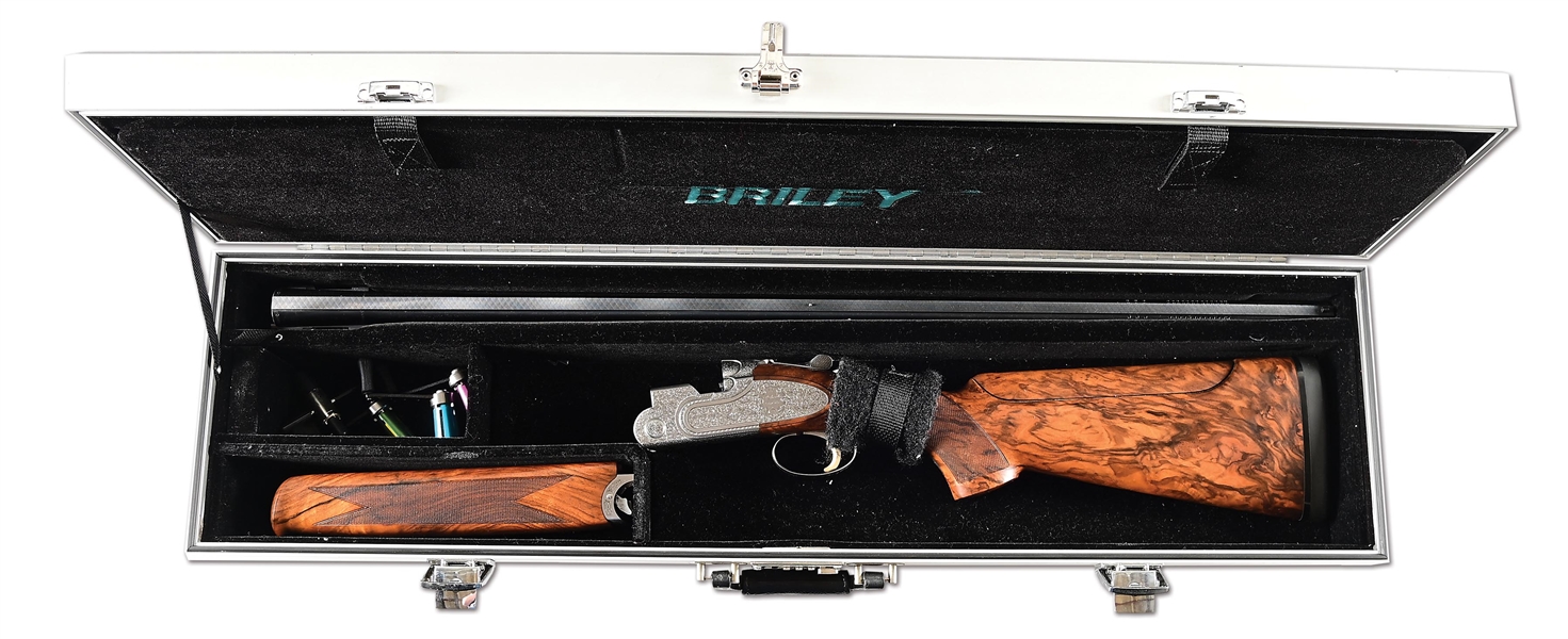 (M) AN EYE CATCHING GIOVANELLI ENGRAVED CASED BERETTA JUBILEE OVER/UNDER SHOTGUN WITH SUBGAUGE INSERTS.