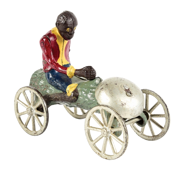 CAST IRON MAN ON LOG CAR THAT RINGS BELL.