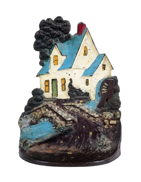 CAST IRON HOUSE BY A STREAM DOORSTOP.