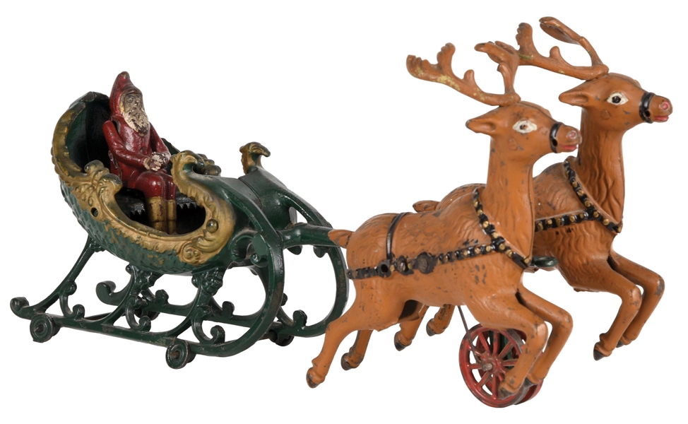 CAST IRON SANTA IN SLEIGH BEING PULLED BY REINDEER TOY.