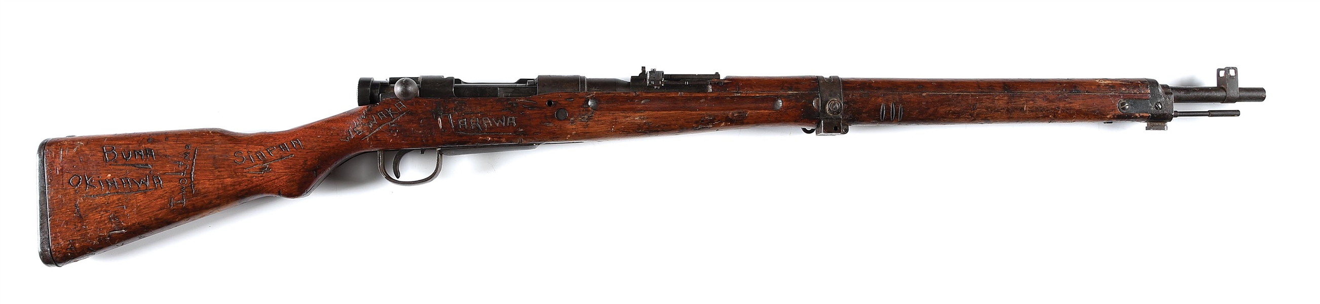 (C) KOKURA TYPE 99 BOLT ACTION RIFLE WITH GI CARVED STOCK.