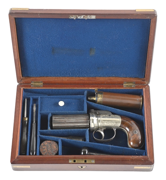 (A) CHARLES JONES ENGLISH PEPPERBOX PERCUSSION REVOLVER IN PARTITIONED WALNUT CASE.