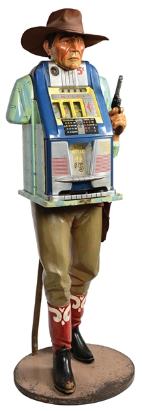 FRANK POLK CARVED ONE-ARMED BANDIT SLOT MACHINE STAND WITH A 5¢ MILLS HIGH-TOP SLOT MACHINE.