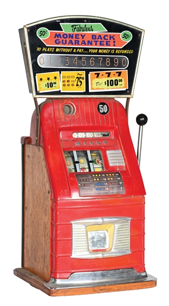 50¢ MILLS HIGH TOP SLOT MACHINE WITH ADDED MARQUEE.