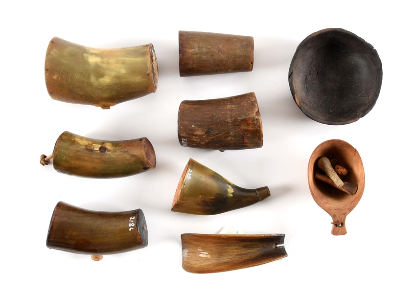 LOT OF HORN CONTAINERS.