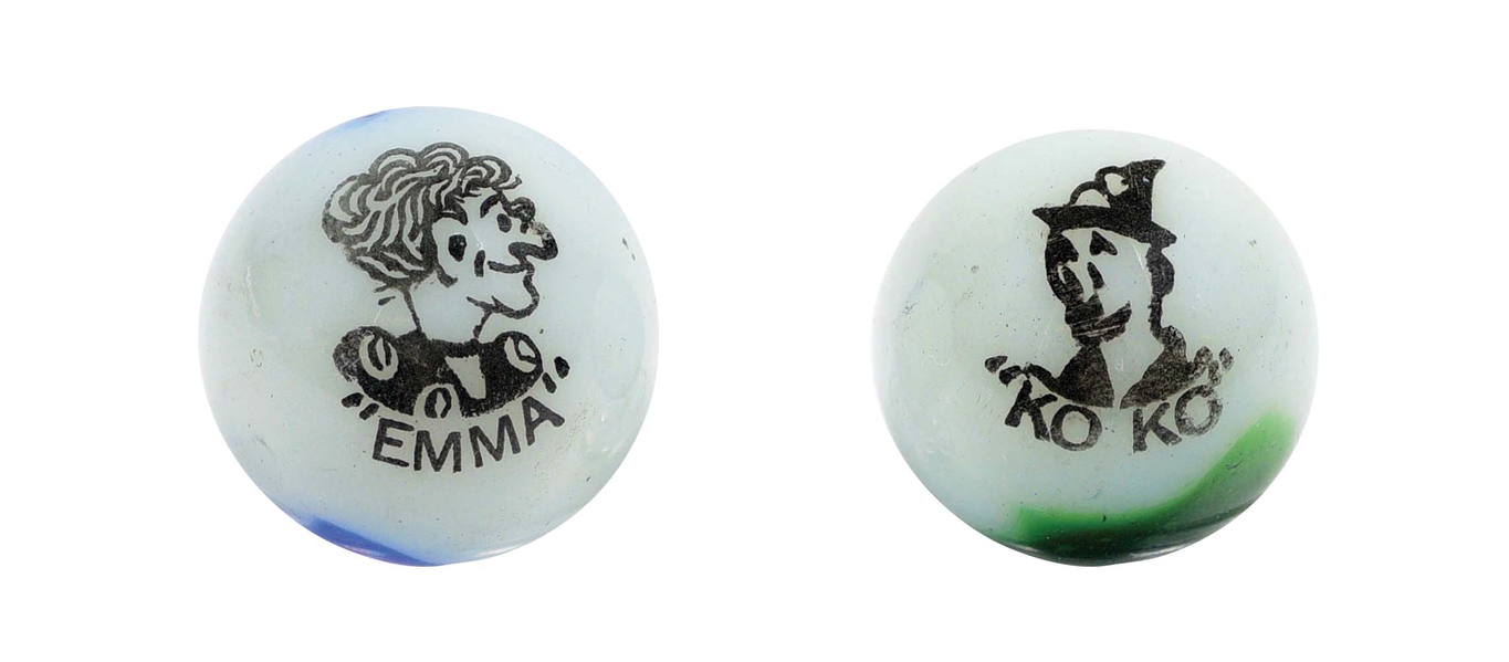 LOT OF 2: PELTIER COMIC MARBLES.