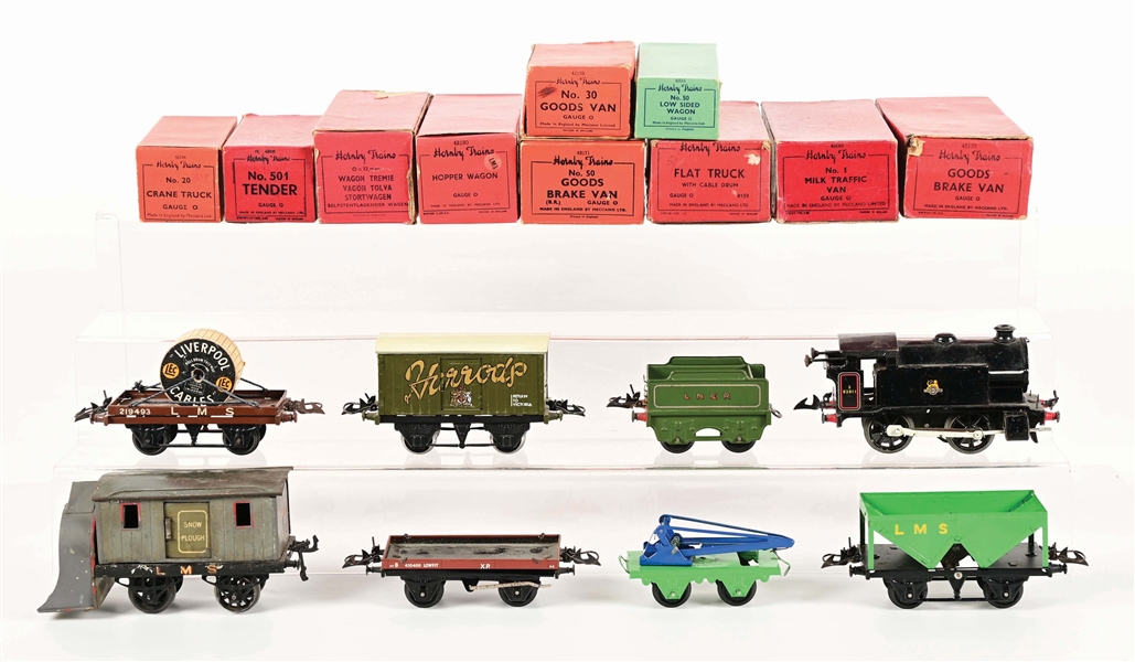 LOT OF 12: "O" GAUGE HORNBY LOCOMOTIVES AND FREIGHT CARS.