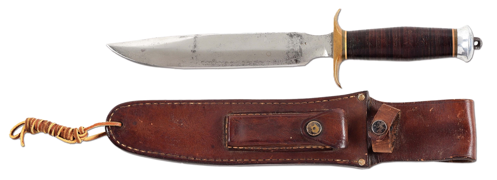 EARLY WWII SPRINGFIELD RANDALL MODEL 1 FIGHTING KNIFE IN LEATHER SCABBARD WITH SHARPENING STONE.