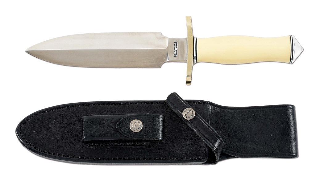 ORLANDO RANDALL TOM CLINTON SPECIAL FIGHTING KNIFE WITH WHITE IVORITE HANDLE AND SHEATH.