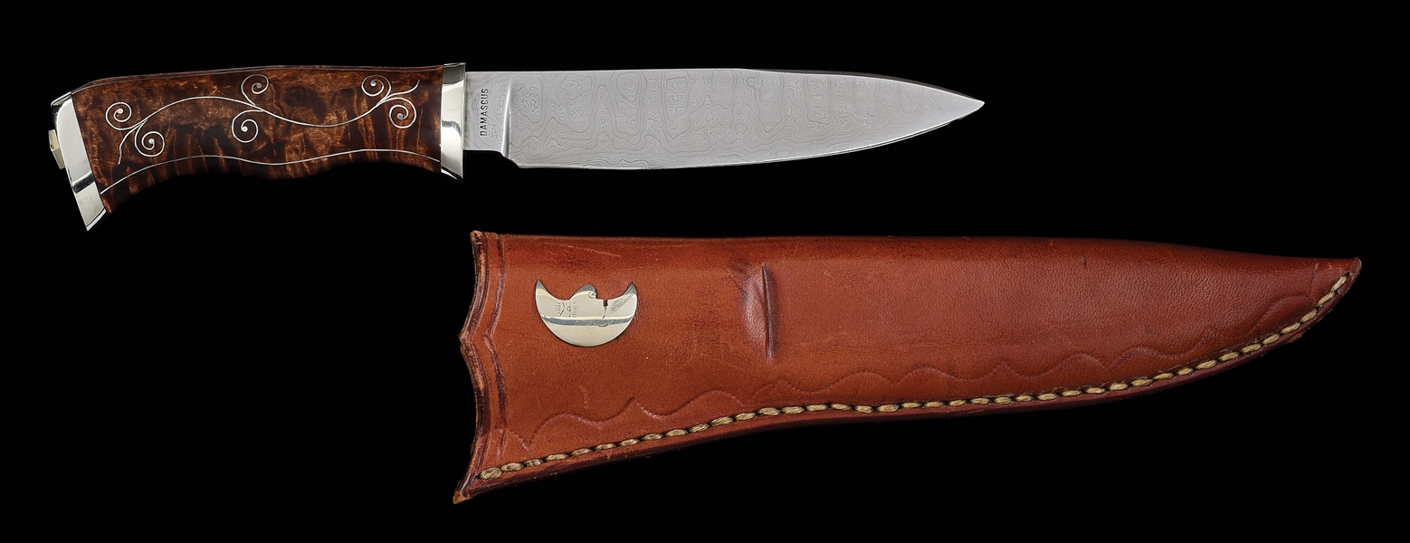 RARE AND DESIRABLE MORAN DAMASCUS HUNTER WITH SILVER INLAID CURLY MAPLE GRIPS, SHEATH, AND SOFT CASE.