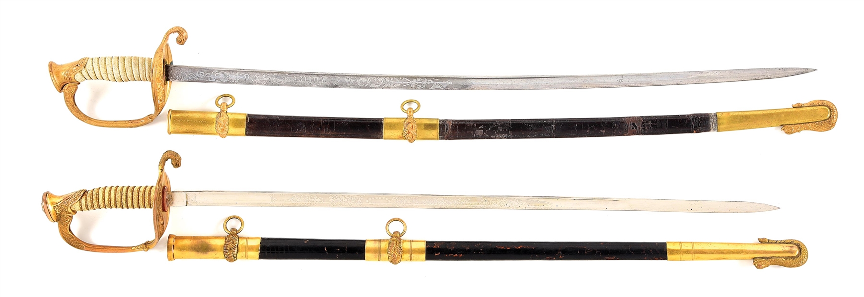 LOT OF 2: US M1852 NAVAL OFFICERS SWORDS, ONE WITH PRESENTATION.