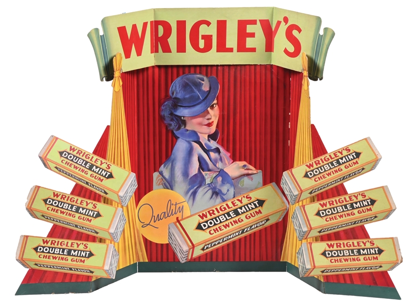 CARDBOARD WRIGLEYS CHEWING GUM WINDOW DISPLAY W/ WOMAN & CHEWING GUM GRAPHICS.