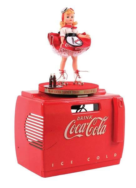 1950S COCA-COLA MUSIC BOX WITH ROATATING SKATER GIRL DISPLAY.