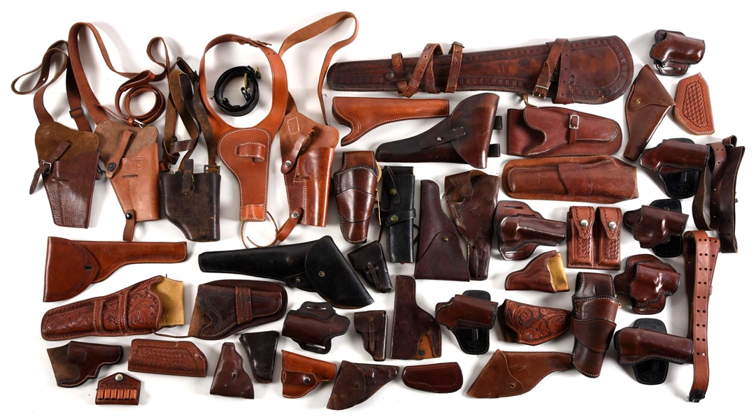 LARGE LOT OF LEATHER HOLSTERS.