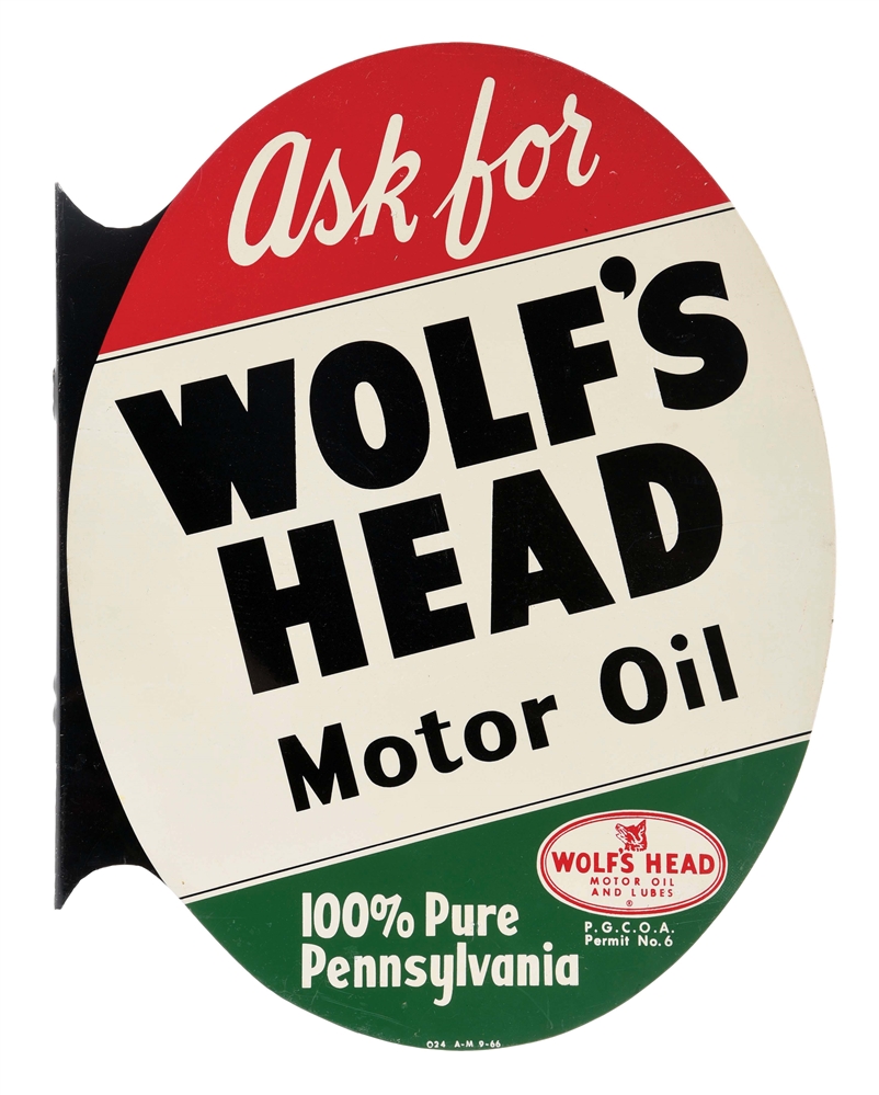 TIN "WOLFS HEAD MOTOR OIL" FLANGE SIGN.