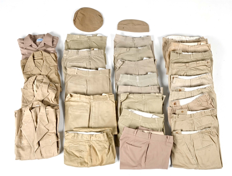 MASSIVE LOT OF US WWII-COLD WAR KHAKI SHIRTS AND TROUSERS.