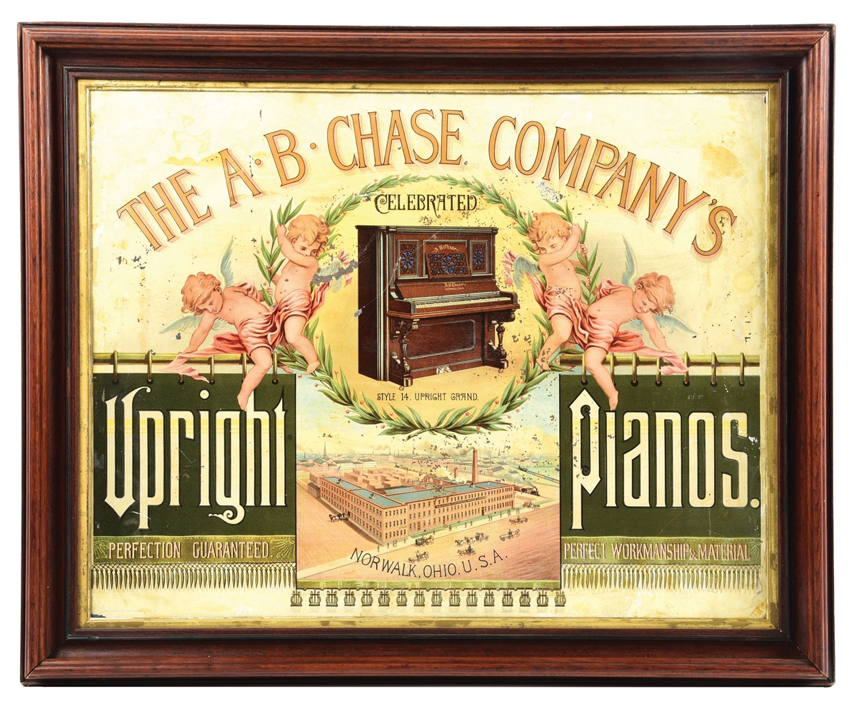 TIN "THE A.B. CHASE COMPANYS UPRIGHT PIANOS" SIGN W/ PIANO GRAPHIC.