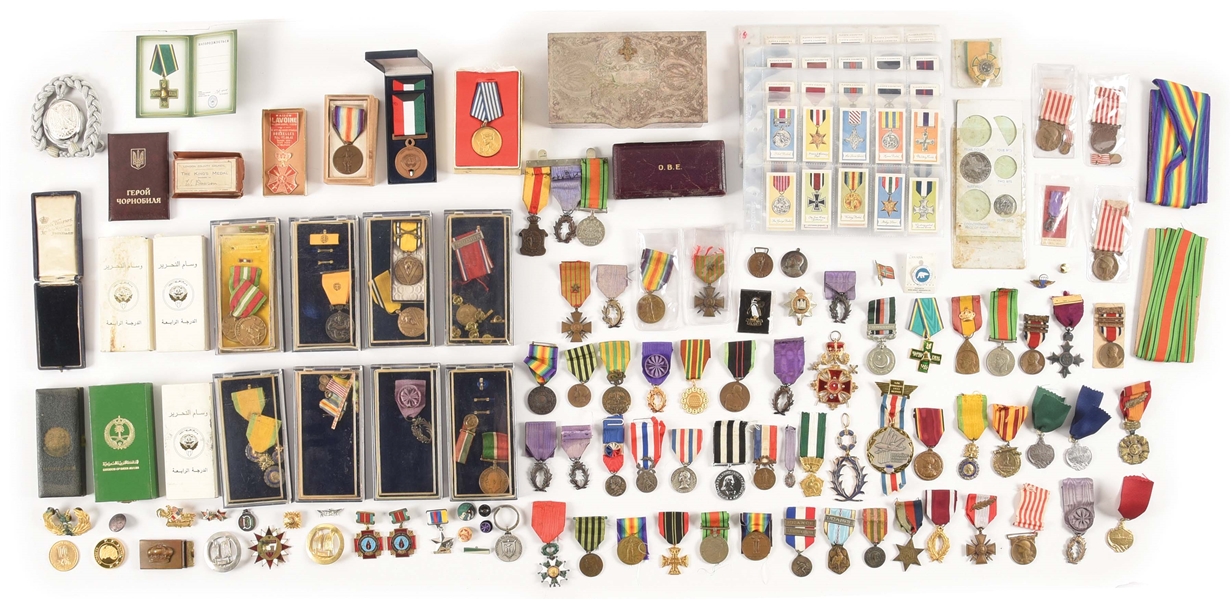 LARGE LOT OF FOREIGN MEDALS, AWARDS, AND INSIGNIA.