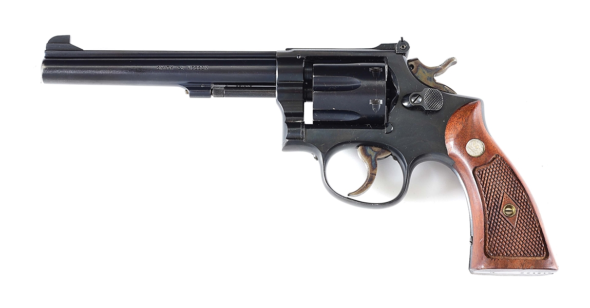 (C) FINE AND SCARCE SMITH & WESSON K-32 MASTERPIECE REVOLVER WITH GOLD BOX.