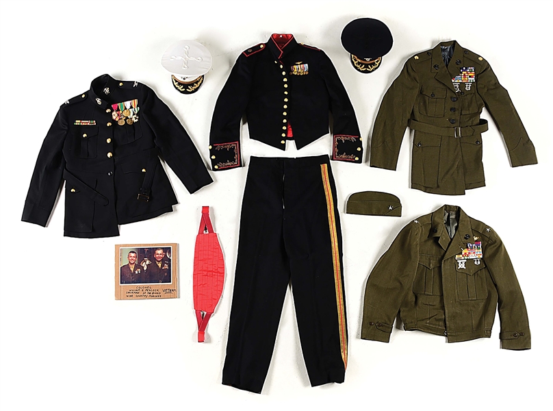 LOT OF 4: US MARINE CORPS DECORATED OFFICERS UNIFORMS.