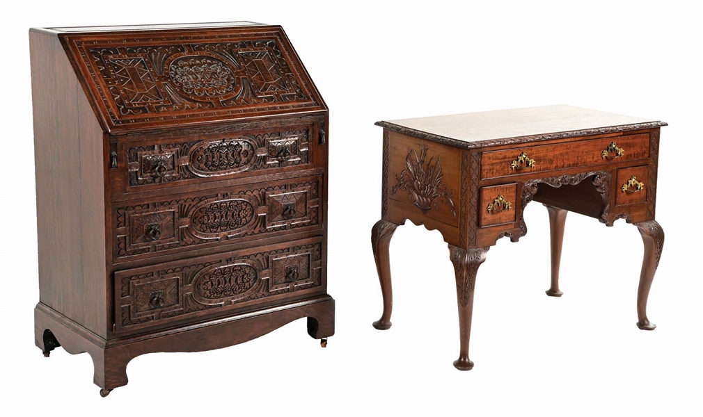 A PAIR OF CARVED OAK DESKS