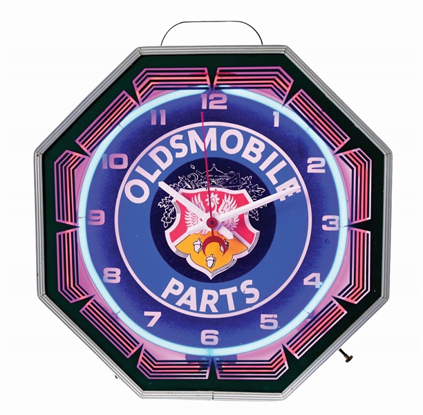 OLDSMOBILE PARTS NEON CLOCK WITH 2 COLOR NEON.