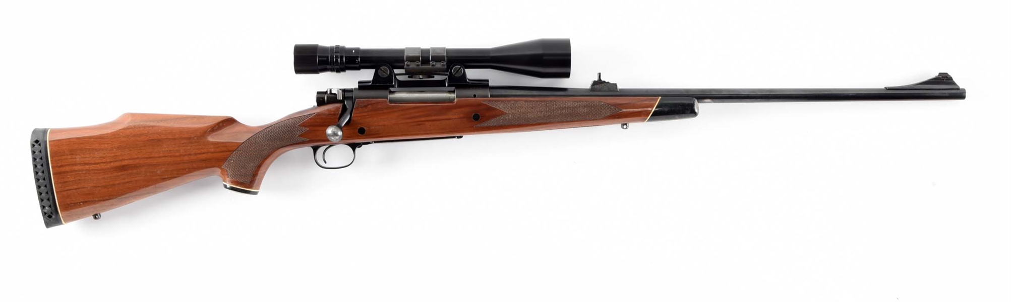 (C) WINCHESTER MODEL 70 BOLT ACTION RIFLE IN .338 WINCHESTER MAGNUM.