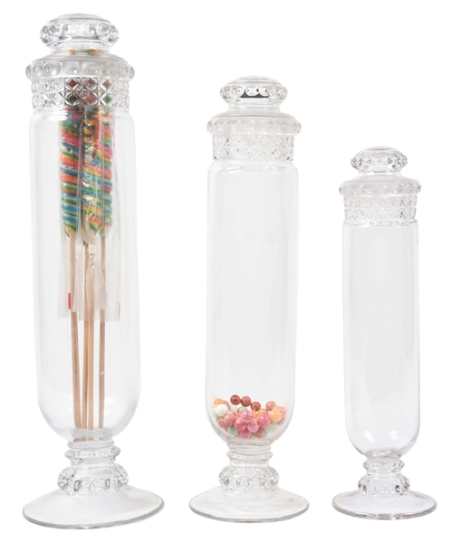 COLLECTION OF 3: DECORATIVE CANDY JARS.