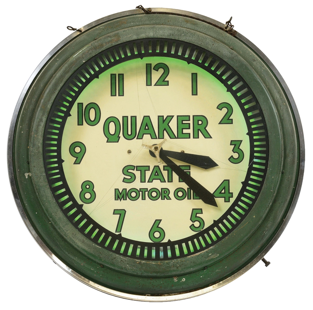 LIGHT-UP QUAKER STATE MOTOR OIL CLOCK.