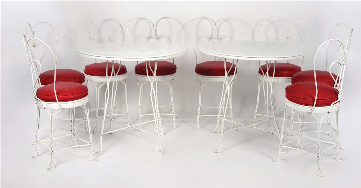 A SET OF 2 METAL SODA FOUNTAIN TABLES W/ 8 CHAIRS.
