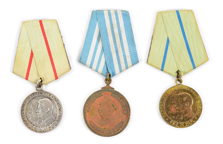 LOT OF 3: SOVIET NAKHIMOV MEDAL, PARTISAN 1ST CLASS, AND PARTISAN 2ND CLASS MEDALS.