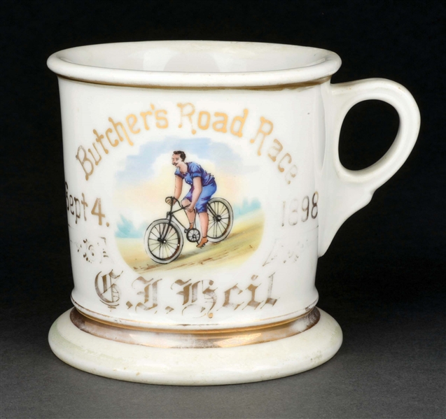 MAN RIDING BICYCLE SHAVING MUG