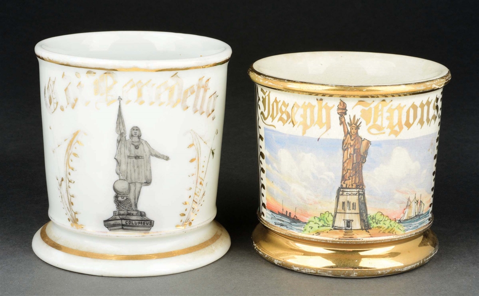 LOT OF 2: STATUE SHAVING MUGS.