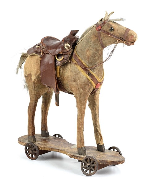 SMALL HORSE PULL TOY WITH SADDLE