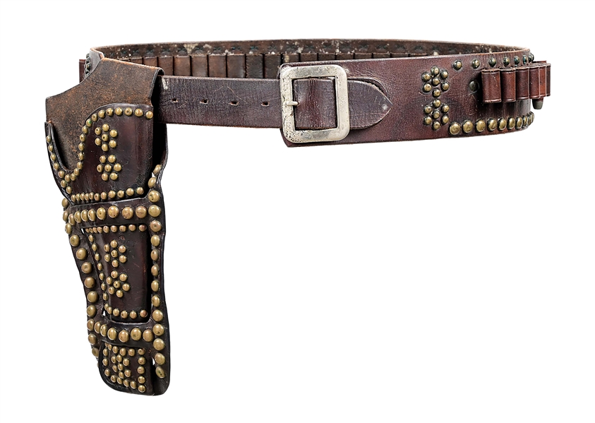 A FANCY STUDDED "WILD WEST" GUN RIG 