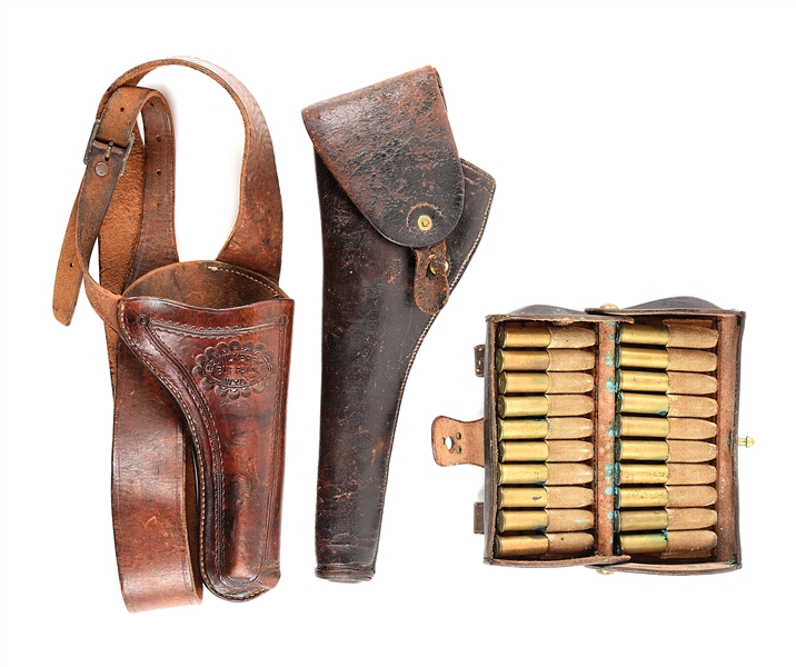 LOT OF ANTIQUE HOLSTERS AND CARTRIDGE BOX.