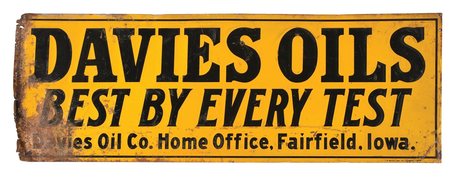 DAVIES OILS "BEST BY EVERY TEST" EMBOSSED TIN SIGN.