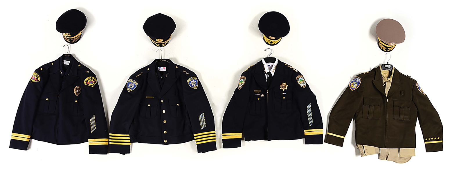 LOT OF 8: 4 CALIFORNIA POLICE CHIEF UNIFORMS WITH 4 HATS.