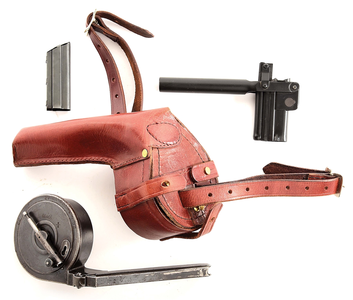 HIGH CONDITION DESIRABLE "BING" MANUFACTURED 1ST MODEL VARIANT GERMAN LUGER SNAIL DRUM WITH LOADER AND LEATHER CARRIER.